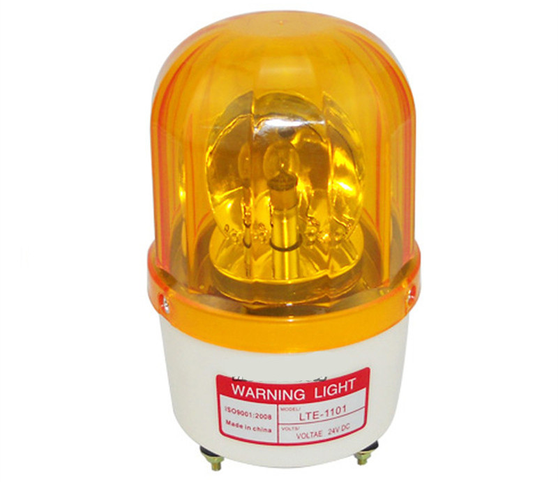 Rotating lamp for refuse compactor trucks